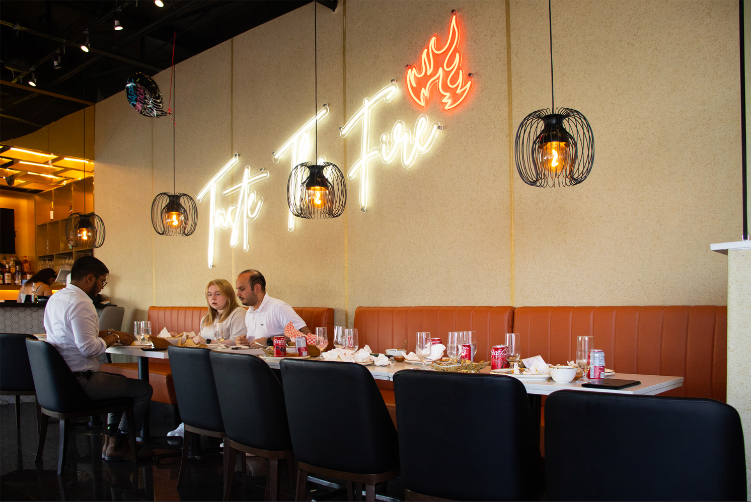 Tikka King dining room, Etobicoke — 'Taste Of Fire' neon sign